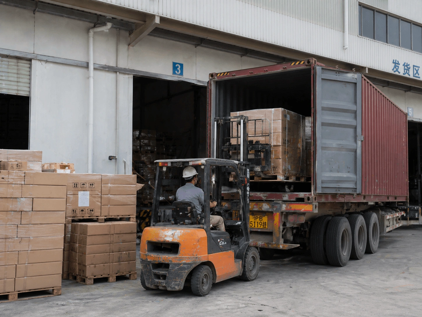 Matcha powder loading into container showing export and logistics capability