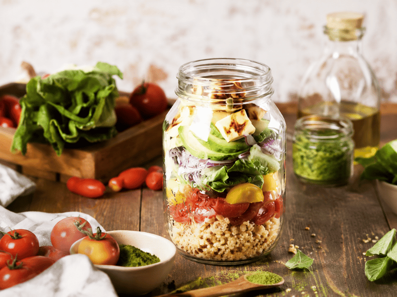 Jar with matcha powder and fresh salad ingredients — custom blends