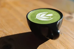 Matcha latte served in single cup showing beverage application in café